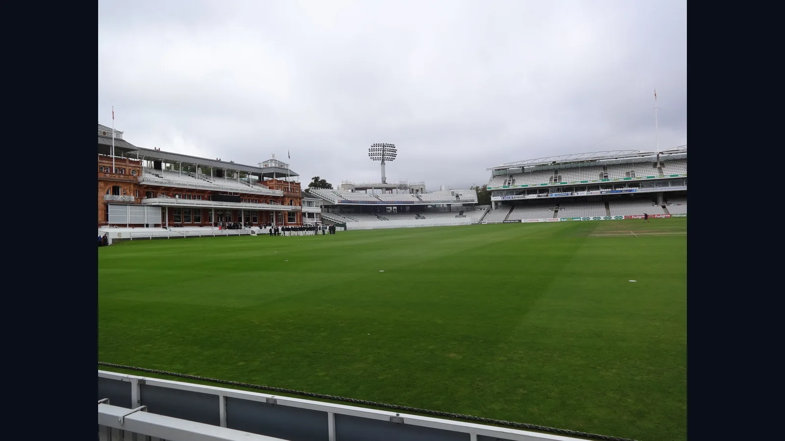 Archival photograph of Lord’s Cricket Ground in London, showing the playing field and Pavilion.