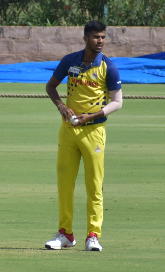 Washington Sundar representing Tamil Nadu during the 2019–20 Vijay Hazare Trophy in Alur, Bengaluru, on 21 October 2019. Holding the ball before bowling.