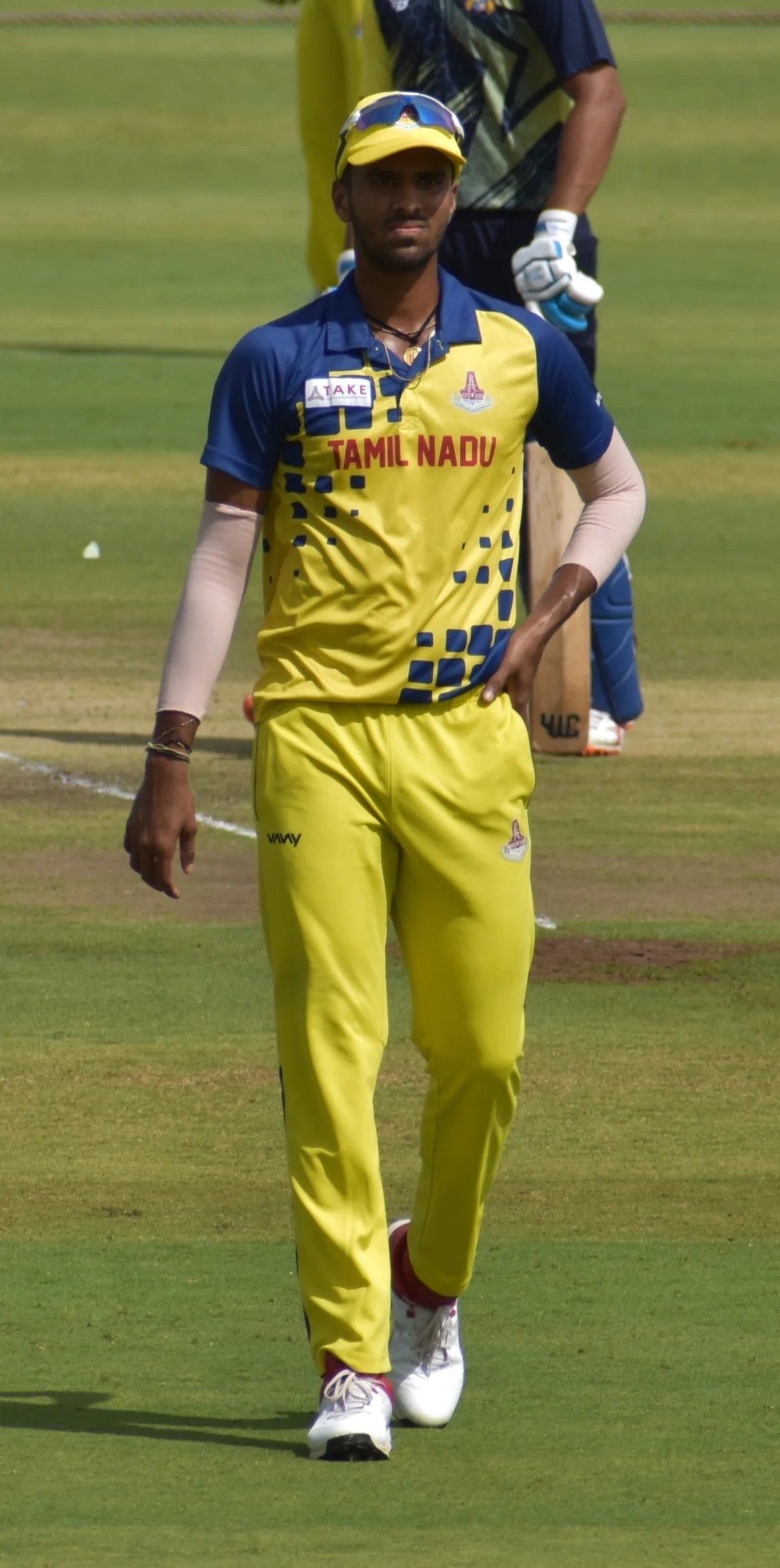 Washington Sundar representing Tamil Nadu during the 2019–20 Vijay Hazare Trophy in Alur, Bengaluru, on 21 October 2019. Walking on the field.